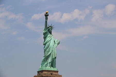Statue of Liberty and New York skyline photo