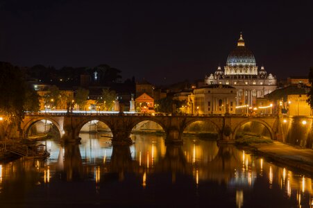 Night view at St. Peter's cathedral in Rome, Italy photo