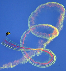 Smoke parachuting sky diver