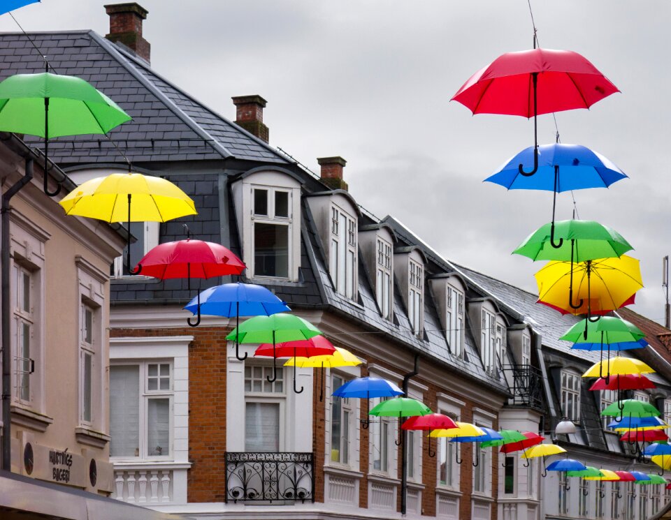 Umbrellas of various colours hanging