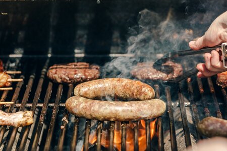 Sausages And Burgers On A Grill