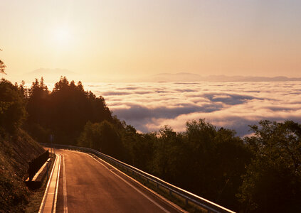 A breathtaking view of the sky at sunrise on the road
