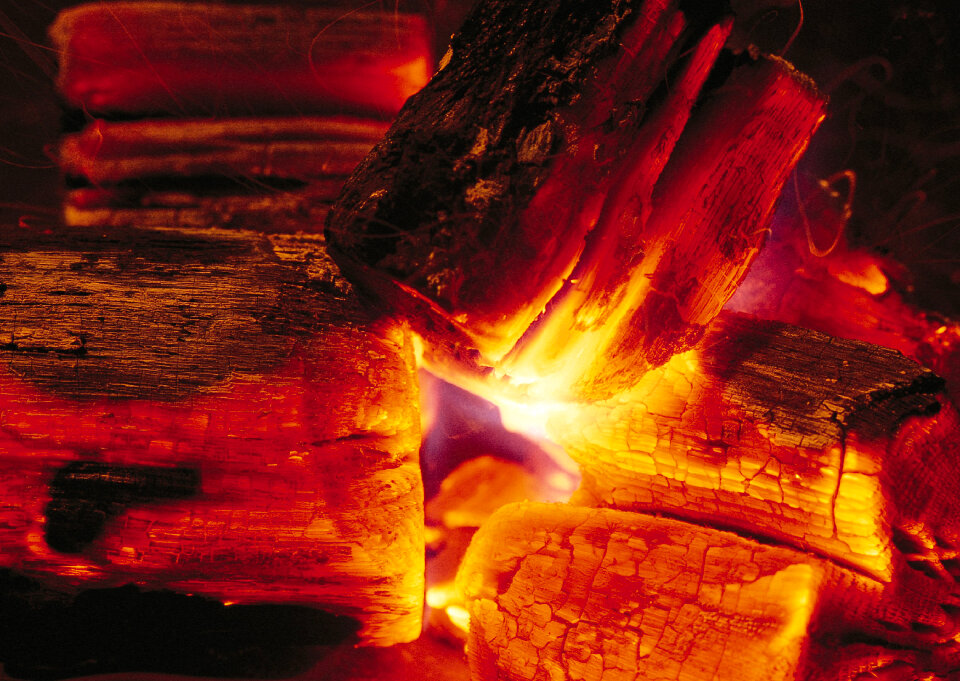 Red burning wood dark abstract background