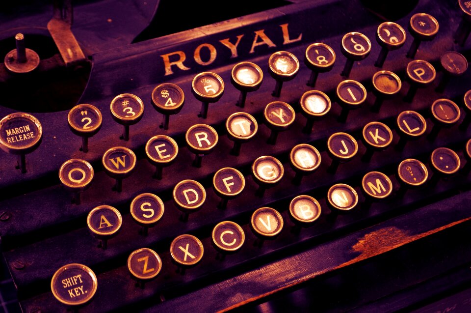 Antique Typewriter. Vintage Typewriter Machine Closeup Photo.