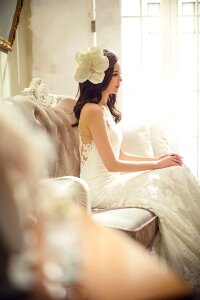 Woman in White Floral Wedding Dress photo