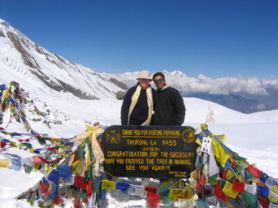 Trekker at Thorong-La pass, annapurna, nepal