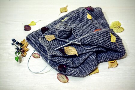 Blue knitting wool and knitting needles photo