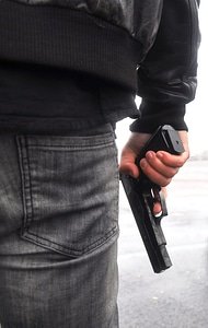 Criminal pistol crime photo