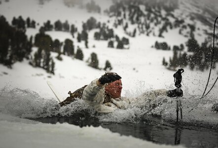 Marine Regiment, plunges into freezing water