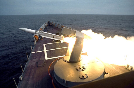 SM-1 surface-to-air missile is launched from the ships photo