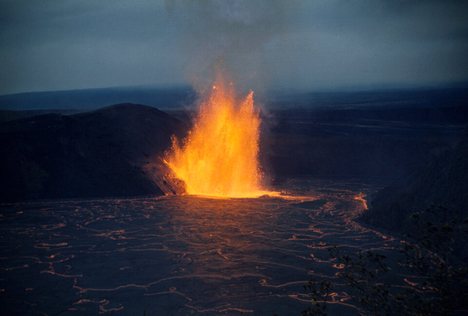 Lava fountain shimmers across lava lake in Kīlauea Iki Crater