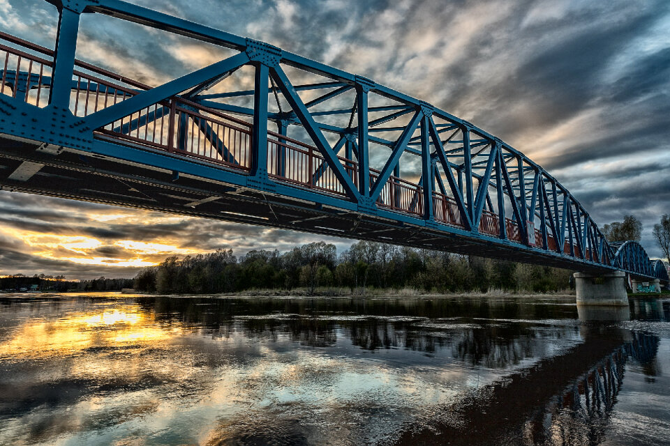 An old bridge construction silhouette at sunset