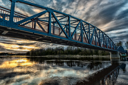 An old bridge construction silhouette at sunset
