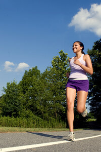 A Young Woman Jogging Outdoors