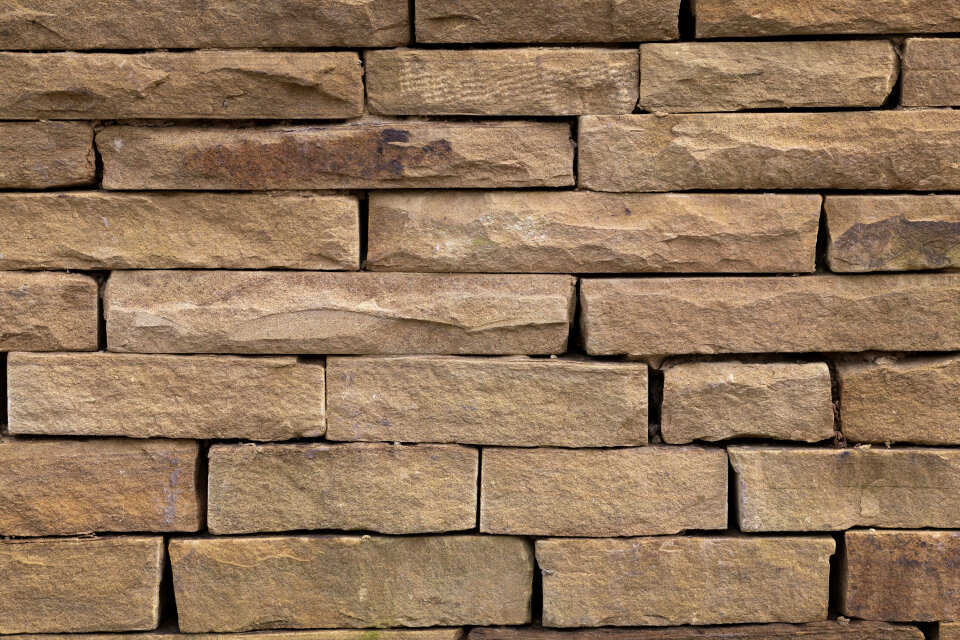 Brown stone wall background image photo