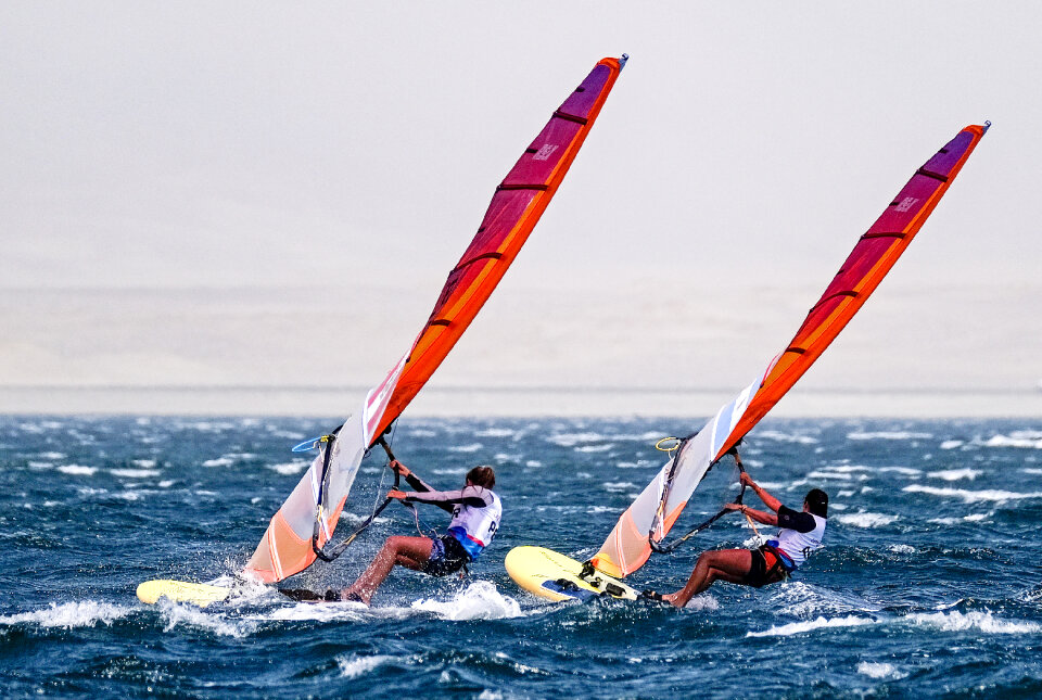 Windsurfer Surfing The Wind On Waves