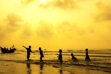 Happy children playing on hot summertime photo