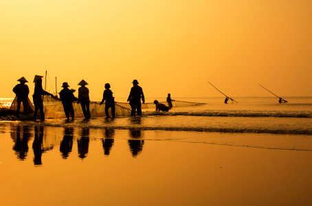 Fishermans are working in sunrise at Sam Son