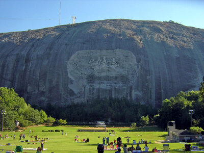 Stone mountain and carving with park visitors