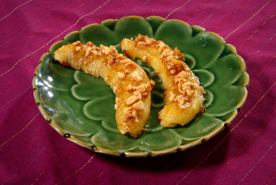 Cooked Bananas On A Green Plate