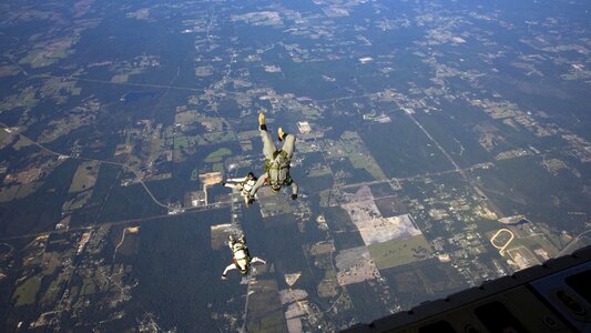 Marine jump out of a C-130 Hercules