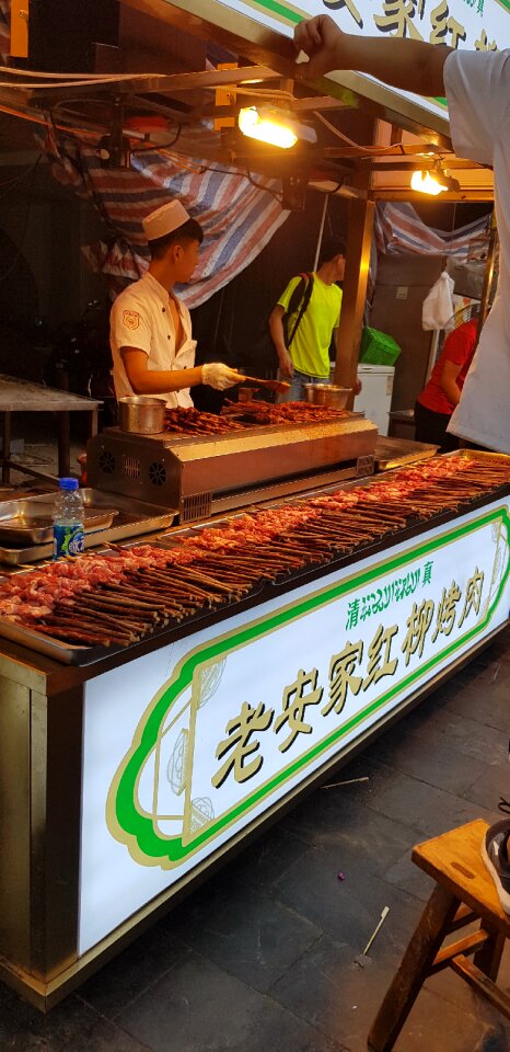 A food stall in a street in the city of Xian in China, Asia