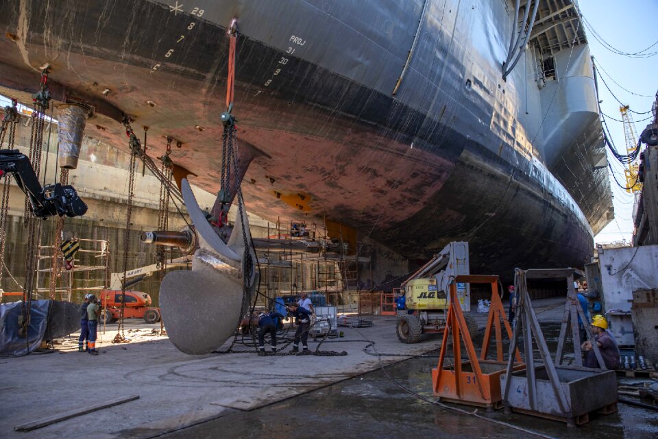 Vessel in the dock. Shipyard inside