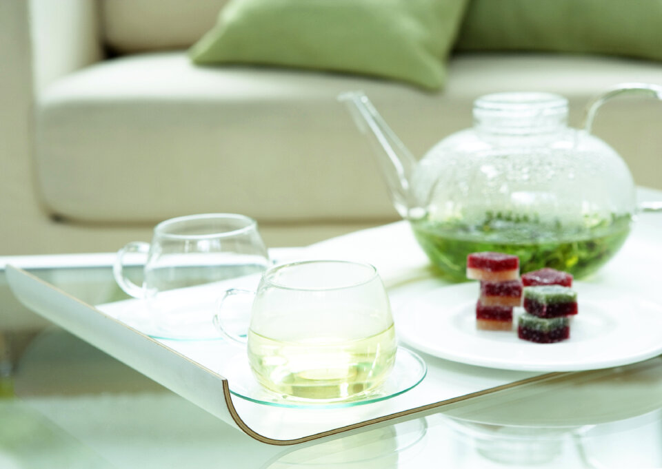 Decorative tea set in living room interior