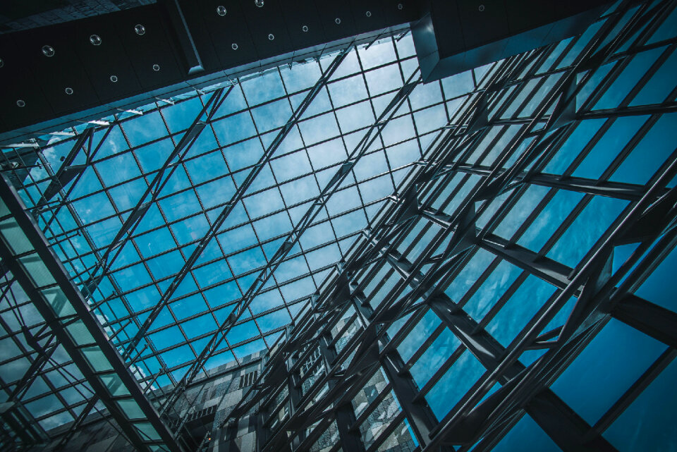 glass office buildings in wide angle view photo