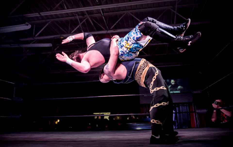 Two Men Battle For Control In Wrestling Match