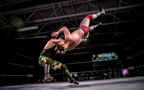 Two Men Battle for Control in Wrestling Match