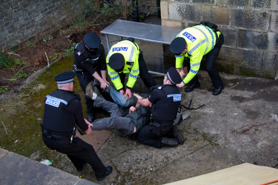 Police arrest an unidentified man