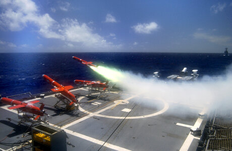 A target drone is fired off the flight deck photo