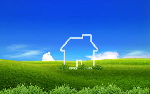 New house vision on green meadow. Conceptual image