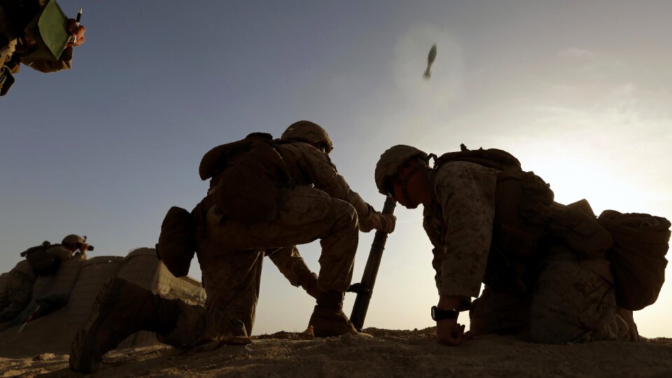 an M224 60 mm mortar at a live-fire range ashore
