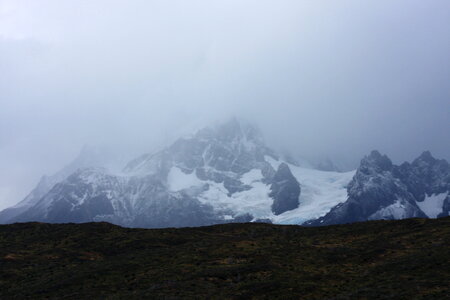 now-covered rocks or among the green forests of Torres del Pain