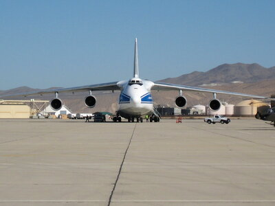 Antonov An-124 unloading Apache attack helicopters