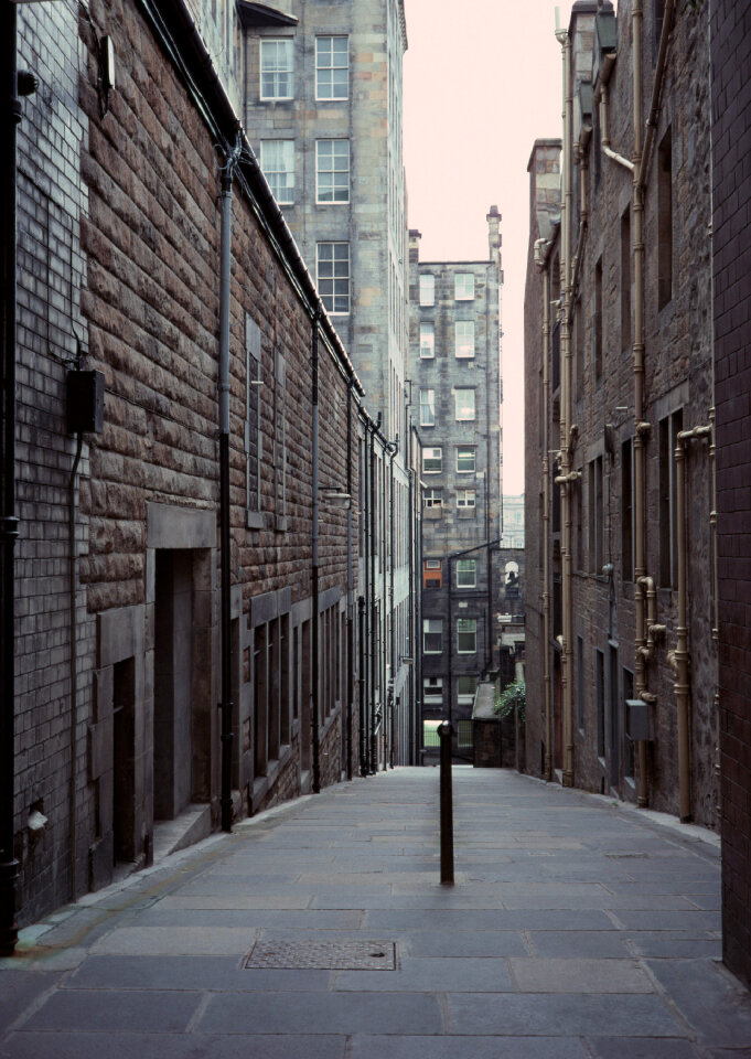 Looking down a long dark back alley