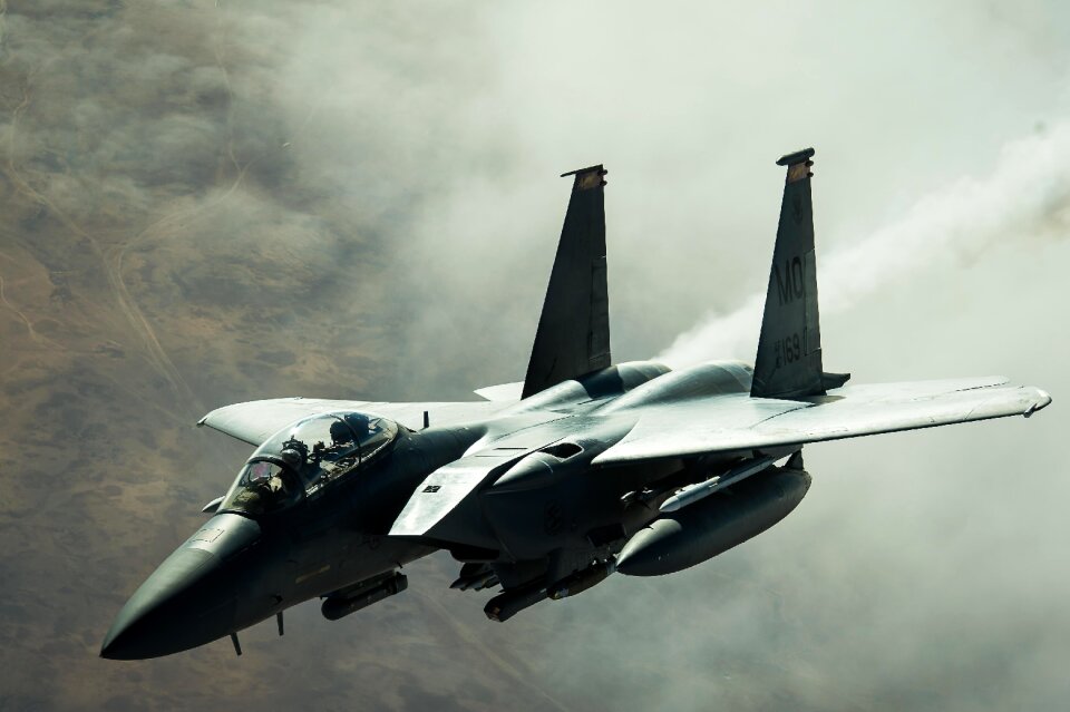 A F-15E Strike Eagle disconnects from a KC-10 Extender