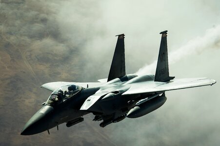 A F-15E Strike Eagle disconnects from a KC-10 Extender