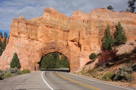 Red Arch road tunnel on the way to Bryce Canyon National Park, Ut photo