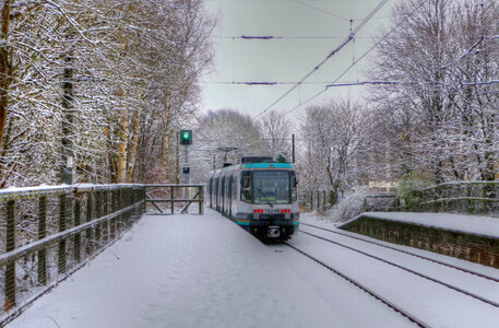 snow covered tram tracks photo
