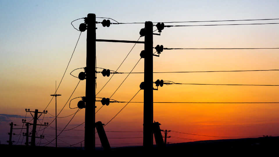 Silhouette of high voltage power lines