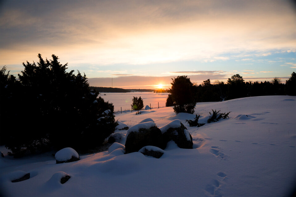 Beautiful winter landscape at sunset with snow