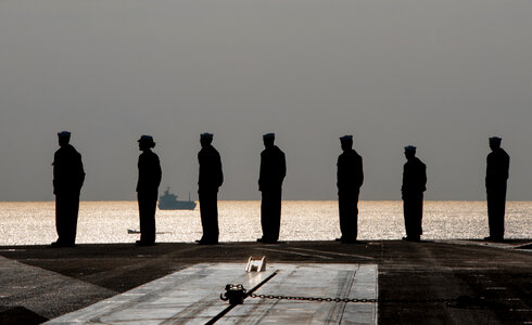 Sailors man the rails as the U.S. Navy photo