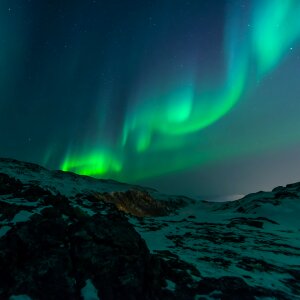 Night sky with amazing northern lights aurora borealis