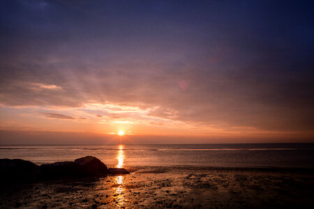Beautiful golden sunset above the sea photo