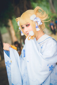 Young cosplayers dress up as Japanese Anime characters photo