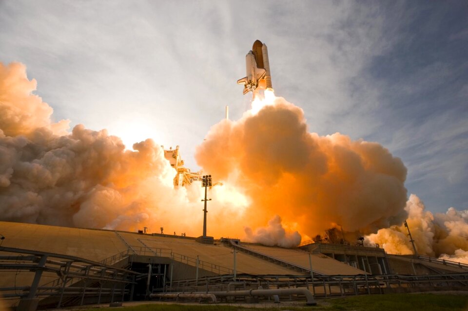 Space shuttle taking off on a mission