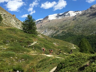 Matterhorn and cyclists enjoying the challenge on mountain trails photo